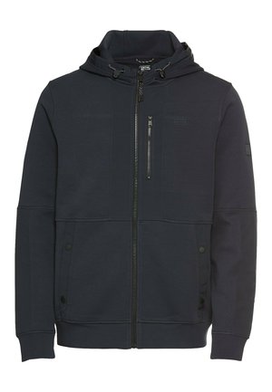 Marineblauwe ritssluiting hoodie met een trekkoord capuchon, voorzien van voorzakken en een klein borstzakje. Strak, modern ontwerp.