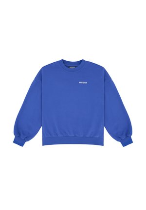 Sweatshirt bleu et pantalon de jogging assorti en tissu doux ; présente des manches larges et des poignets élastiques ; logo blanc sur la poitrine et le pantalon.