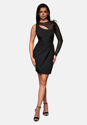 Black dress featuring one sleeveless side and one textured mesh sleeve, with a cutout detail and fitted silhouette. Accented with a feather.