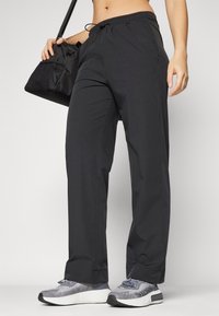 Champion C-TECH WIDE LEG PANTS - Pantalon classique - black