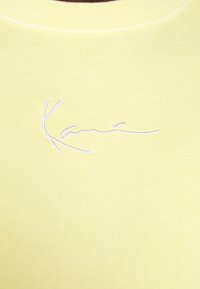 Karl Kani SMALL SIGNATURE WASHED CREW UNISEX - Sportska majica - light yellow