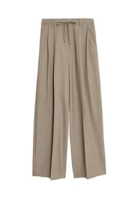 Beige hochgeschnittene Hose mit lockerer Passform, mit Falten und einem Kordelzugbund. Das Material wirkt strukturiert und leicht.