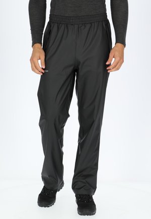 Black waterproof pants with an elastic waistband, tapered legs, and side zip pockets, made from a smooth, lightweight material.