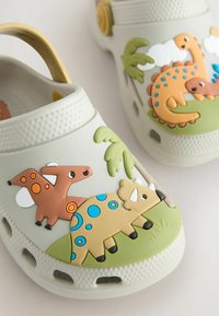 Next REGULAR FIT CHARACTER WITH BACKSTRAP - Sabots - neutral dinosaur print scene