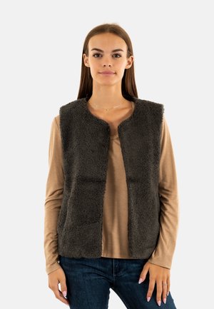 Neppelsen vest in donkergrijs met een ronde halslijn en een open voorkant. Draag dit over een beige langemouwen top, in combinatie met blauwe jeans. Soepele textuur.