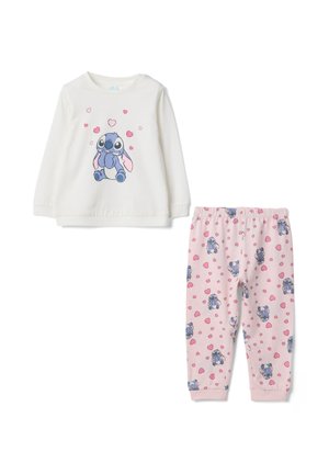 Kinder-Pyjama-Set mit einem weißen Langarmshirt, das eine blaue Figur und rosa Herzen zeigt, kombiniert mit rosa Hosen, die mit derselben Figur und Herzen bedruckt sind.