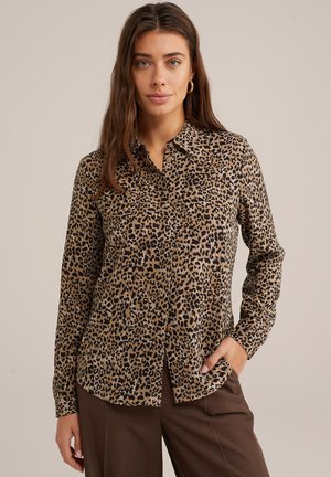Leopardprint shirt in bruin en zwart, met een knoopsluiting, lange mouwen en een kraag. Soepele stof met een comfortabele pasvorm.
