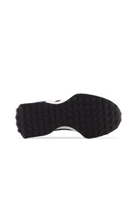 Czarna gumowa podeszwa buta z teksturowanym wzorem małych, okrągłych wypustek, z białym akcentem wzdłuż krawędzi i o ogólnie zaokrąglonym kształcie.