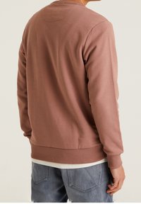 CHASIN' Sweatshirt - pink