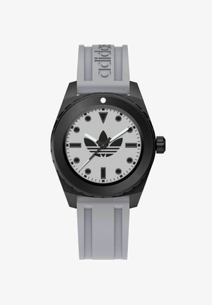 Must mustriga mustra mustra, suur ümmargune nägu, hall dials, valged käed ja silmapaistev Adidas logo, halli kummirihmaga.