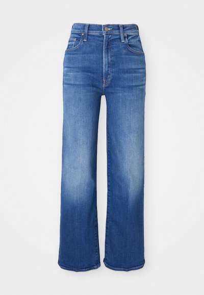 Wide-leg denim jeans in medium blue with a faded wash, featuring a high-waisted design, zipper fly, and five pockets. Cotton material.