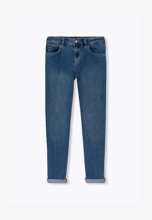 Jean en denim bleu foncé avec une coupe slim, présentant une jambe retrécie, des ourlets retroussés, et des coutures visibles sur les poches et la ceinture.