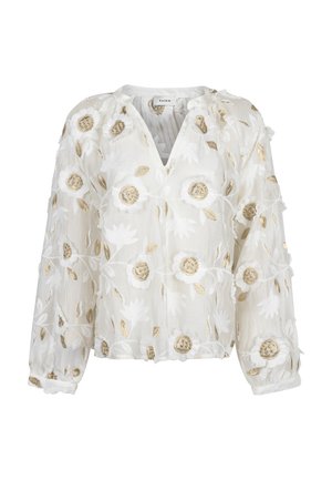 Blouse blanche semi-transparente à manches longues, col en V, avec broderies florales dorées et blanches sur toute la surface.