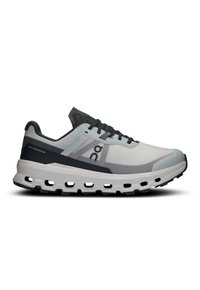 Athletic shoe featuring a lightweight gray mesh upper, dark gray accents, a thick white sole with cut-out sections, and textured details.