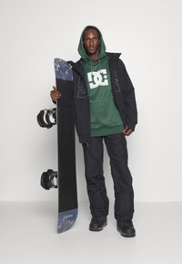 DC Shoes BANSHEE - Nohavice do snehu - black