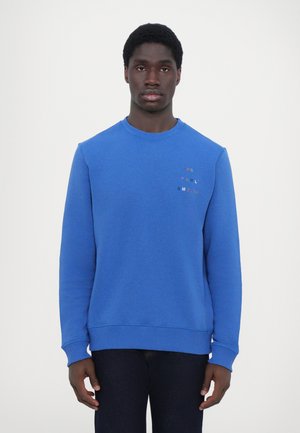 Sweatshirt en coton bleu avec un col rond, des poignets et un ourlet côtelés. Présente un logo en texte multicolore sur la zone gauche de la poitrine.