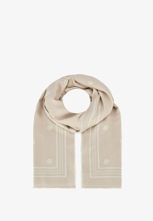 Écharpe beige en matériau doux, ornée de motifs de logo discrets et de bords blancs avec des franges, disposée en boucle.