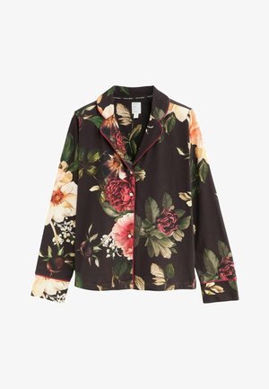 Koszulka z długim rękawem w kwiatowy wzór z guzikami. Posiada ciemne tło, żywe kwiaty w odcieniach różu, czerwieni i żółci, z kontrastującymi czerwonymi lamówkami.