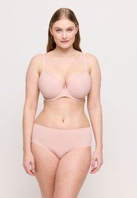 Jasnoróżowy stanik i pasujący zestaw fig. Stanik ma gładki, formowany kształt z regulowanymi ramiączkami. Figi mają elegancki, bezszwowy krój.