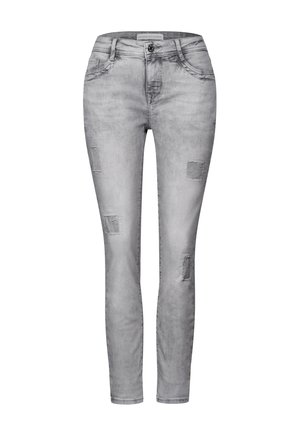 Graue Denim-Skinny-Jeans mit angeschliffenen Patches, Fünf-Taschen-Design und einem klassischen Knopfverschluss an der Taille. Glatte Textur.