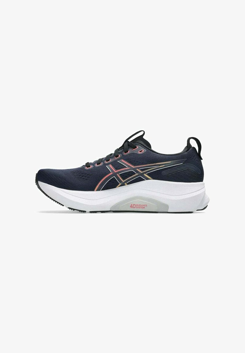 Chaussure de sport marine avec un upper texturé, des accents rose et or, et une semelle intermédiaire blanche épaisse comportant le détail "Système de Guidage 4D".