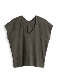 Haut ample à manches courtes de couleur vert olive avec une texture, un col en V et un subtil détail froncé sous l'encolure.