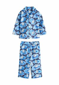 Sininen pyjamakokonaisuus, joka koostuu napitettavasta paidasta ja joustavyöisestä housusta, joissa on valkoisia sarjakuvahahmoja ja pilvikuvioita tummansinisellä taustalla.