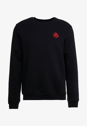 Black sweatshirt with ribbed cuffs and hem. Features a small red circular logo on the upper left chest area. Made of soft material.
