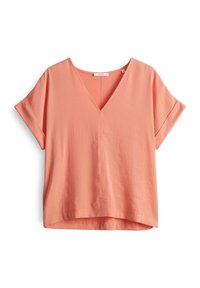 Pfirsichfarbene V-Ausschnitt-Bluse mit kurzen umgeschlagenen Ärmeln, aus leichtem Material gefertigt und mit einem leicht abgerundeten Saum sowie sichtbaren Nähten.