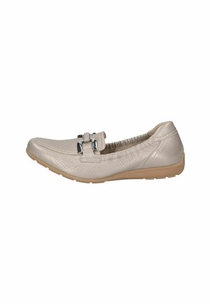 Light beige leather flat shoe featuring a textured finish, rounded toe, elasticized sides, and a decorative silver buckle accent.