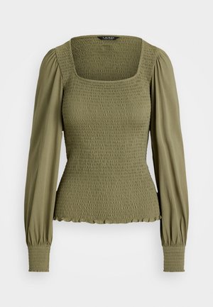 Olive green blouse with a square neckline, smocked bodice, and long puff sleeves. Features elastic cuffs and a scalloped hem.