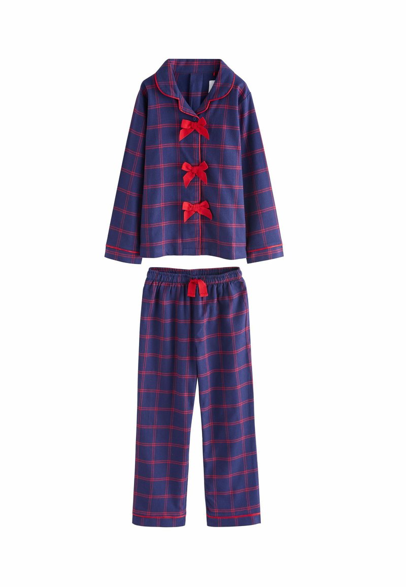 Námořnické modré kostkované pyžamo s červenými akcenty, se zapínáním na knoflíky, třemi červenými mašlemi a odpovídajícími kalhotami s elastickým pasem. Měkká textilie.