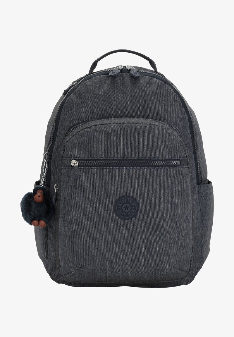 Dark gray backpack with a textured fabric, zippered compartments, and a monkey keychain. Features a circular logo on the front.