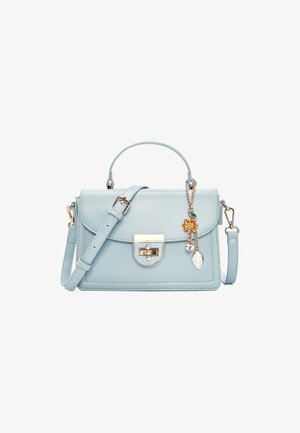Light blue leather handbag with top handle, adjustable shoulder strap, gold-tone clasp, and floral charm with orange flower and leaf.