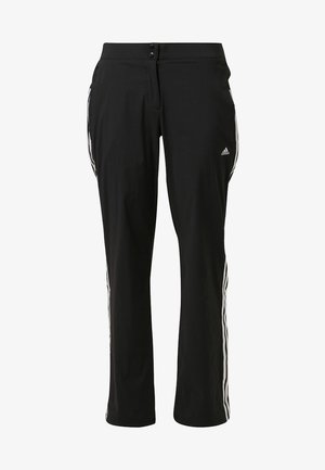 Pantalon de survêtement noir Adidas avec bandes blanches sur les côtés, poches avant et fermeture de taille à double bouton.