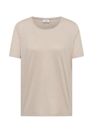 T-shirt beige à manches courtes et col rond, en tissu subtilement texturé avec une couture simple, étiqueté "CECIL" au niveau du col.