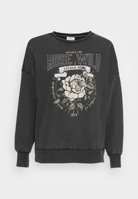 Black sweatshirt with long sleeves, crew neckline, and floral graphic in white and green. Features text "Untamed and Rose Wild, Savage Son."