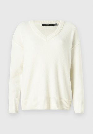 Maglione bianco a scollo a V con polsini e orlo a costine. Tessuto morbido, vestibilità ampia e spacchi laterali. Etichetta visibile sul collo.
