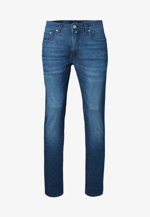 Donkerblauwe denim jeans, slim fit ontwerp met vijf zakken, rits en knoopsluiting. Licht vervaagde textuur aan de voorkant en achterkant.