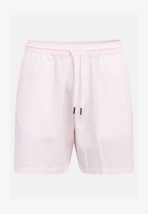 Hele roosad tekstuuriga lühikesed püksid elastse vöökohaga ja valge paelaga mustade otstega, esikülg tavalise tausta peal.