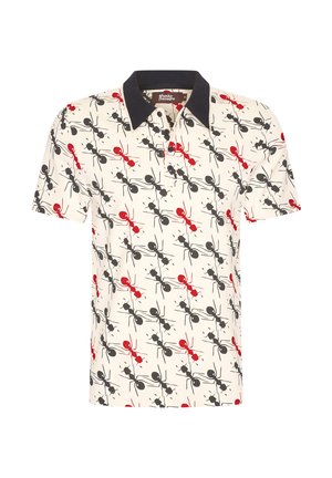 Short-sleeve polo shirt in cream fabric featuring black and red abstract figures, classic collar, and three-button placket.