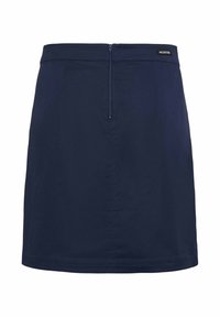 Jupe bleu marine longueur genou avec fermeture éclair centrale au dos et petite étiquette noire IW.EDITION à la taille.