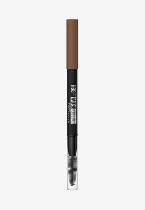 Maybelline Tattoo Brow blyant med brun hætte, sort krop og klar applikator. Har en fin spids og spoolie pensel til præcis påføring.