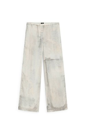 Pantalons à jambes larges en beige clair avec une finition texturée subtile. Dotés d'une taille élastique et d'un tissu lisse et fluide.