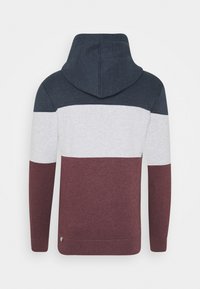 Kapuzenshirt mit Farbblöcken in Marineblau, Grau, Weiß und Burgunderrot. Hergestellt aus weichem Stoff mit gerippten Bündchen und Saum.