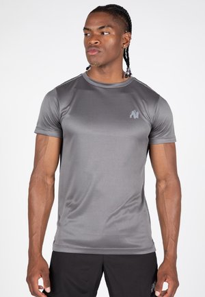 Graues, kurzärmliges Sportshirt mit rundem Halsausschnitt, aus glattem Stoff gefertigt. Verfügt über ein kleines, dezentes Logo auf der Brust.