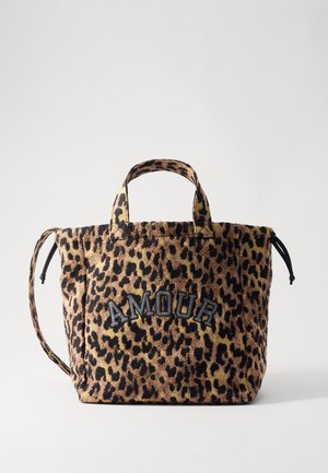 Leopard-print tote bag with short handles and a black "AMOUR" patch. Made from soft fabric, featuring drawstring closure and textured surface.