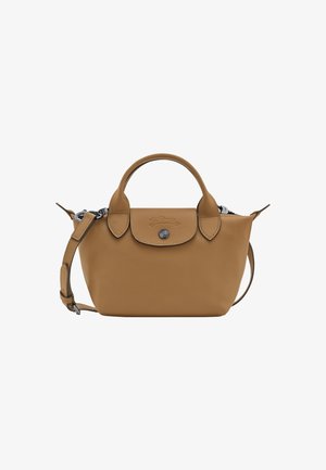Tan leather handbag with rounded top handles, a detachable shoulder strap, and a snap closure. Features embossed logo on the front.