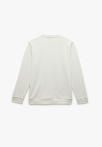 Lyse beige sweatshirt med lange ærmer, lavet i et struktureret stof, med ribbede manchetter og rund halsudskæring. Bagfra ses et simpelt, rent design.