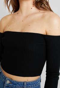 Missguided Stickad tröja - black